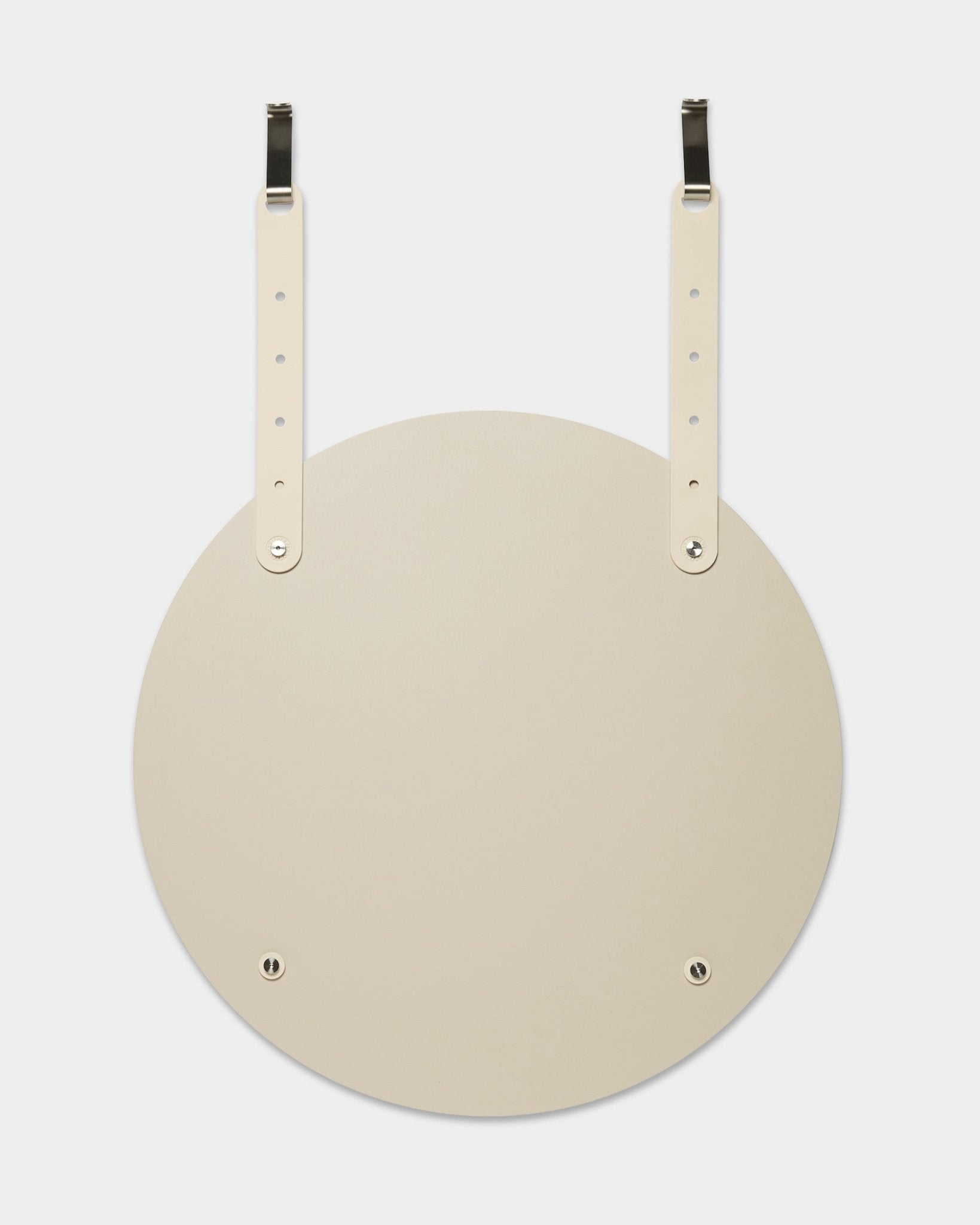 Le Vala | Mirror / BM1 de WoodUpp est un miroir mural rond beige, avec des sangles en cuir réglables pour la suspension ; l’installation ne nécessite aucun perçage mural.
