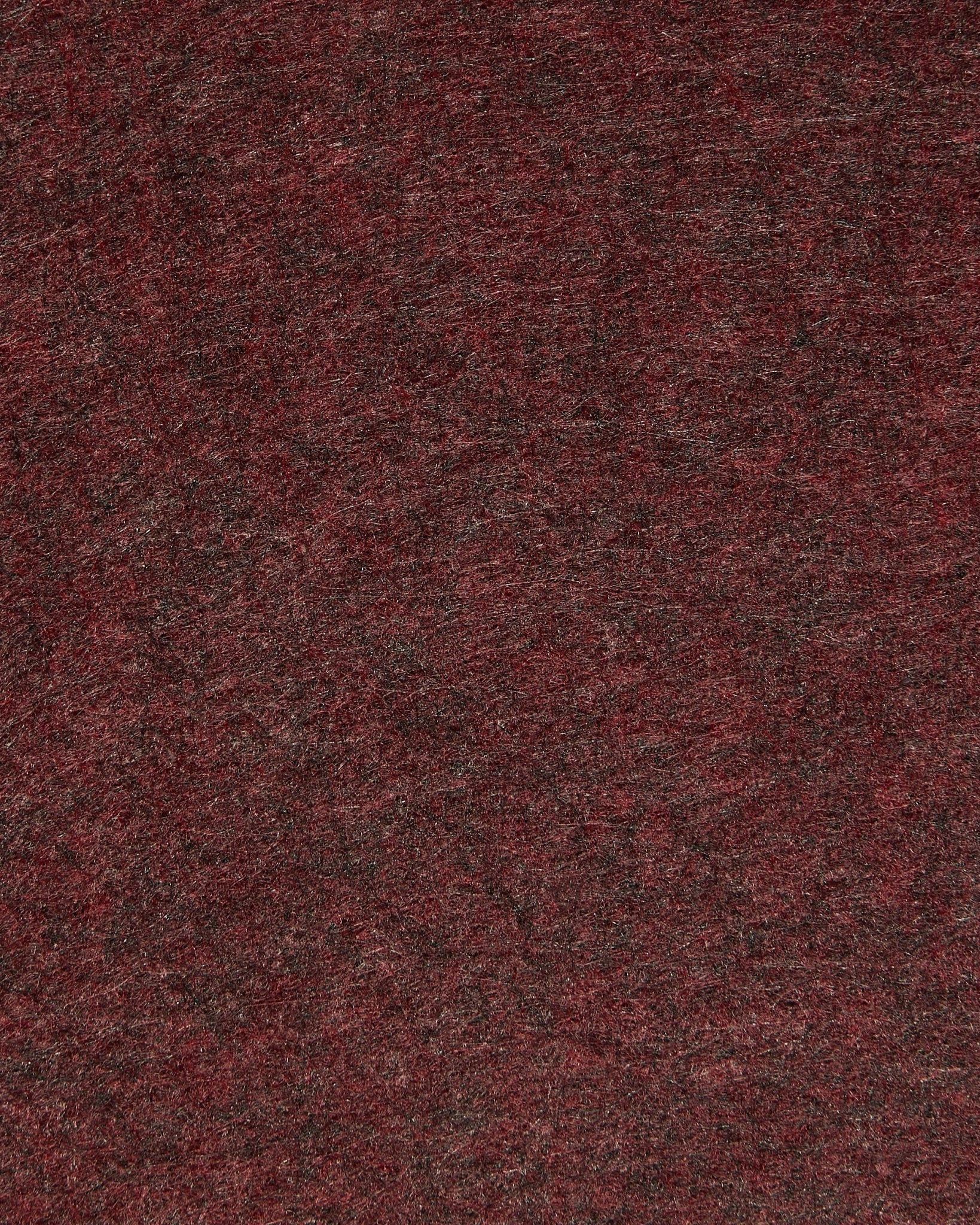 Gros plan sur WoodUpp Vigg | Felt Box / BM2 en ox red, mettant en valeur le feutre acoustique texturé avec de légères nuances et des fibres visibles.